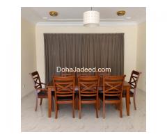 solid wooden 8 seater dining table