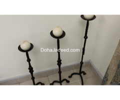 Set of three candle stands for sale