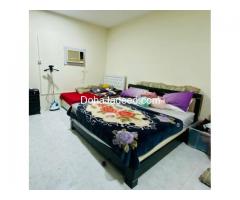 Single white bed with mattress
