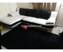 Sofa lather with rug