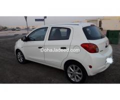 Mitsubishi mirage 2014 white Colour.